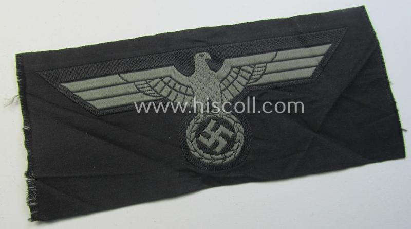 Later- (ie. mid-war-) period, WH (Heeres) 'Panzer'-type breast-eagle (ie. 'Brustadler für Panzertruppen') being a 'virtually mint- ie. unissued' example as executed in bluish-grey-coloured linnen on a black-coloured background