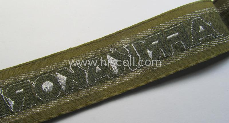 Superb, 'BeVo'-like cuff-title (ie. 'Ärmelstreifen') entitled: 'Afrikakorps' being a presumably issued but never worn example that comes in an overall very nice- (ie. non-shortened- and never tunic-attached-), condition