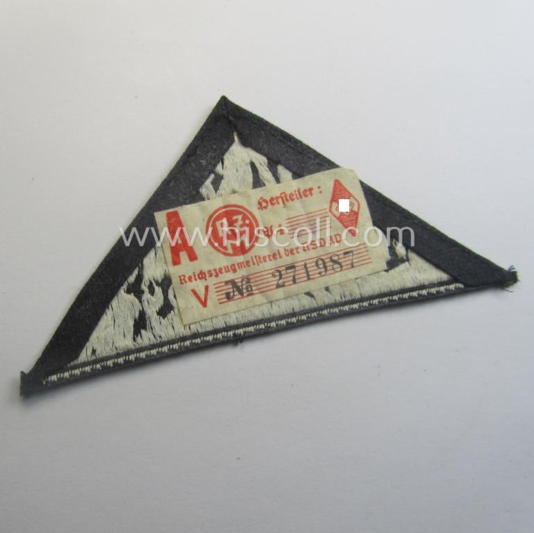 'HJ' ('Hitlerjugend') ie. 'BDM' ('Bund Deutscher Mädel'-) district-triangle (ie. 'Gebietsdreieck') entitled: 'West Düsseldorf' (being a minimally used- and/or worn example that retains its 'RzM'-etiket)