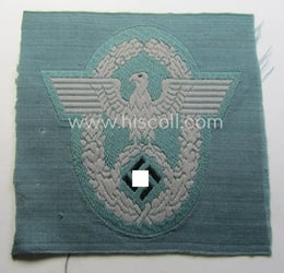 Police- (ie. 'Polizei'-) related armbadge (ie. arm-eagle) being...