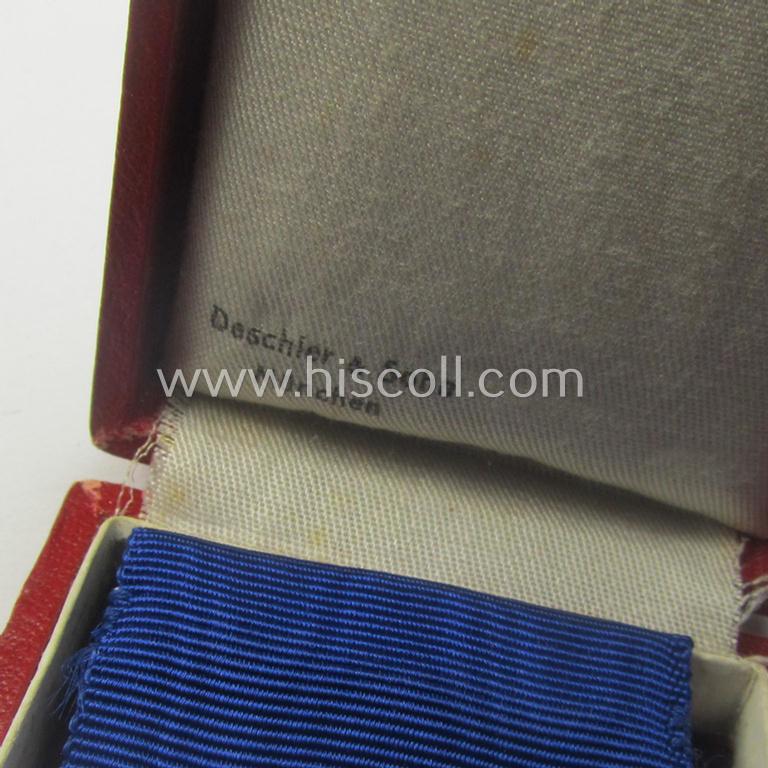 'Treuedienst Ehrenzeichen 1. Klasse' being a non-maker-marked example that comes in its neatly maker- (ie. 'Deschler & Sohn'-) marked etui