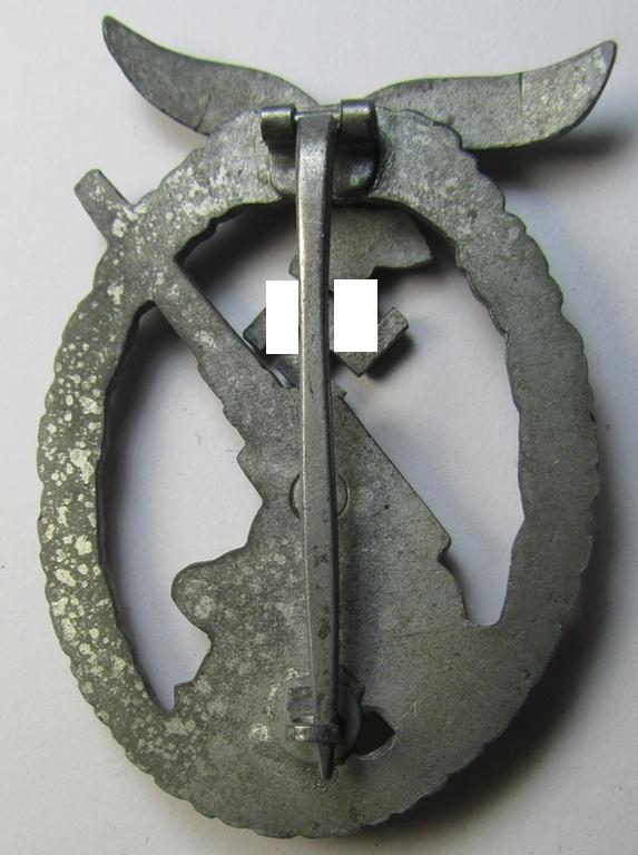 Superb - and rarely seen! - 'Feinzink'-based- example of a maker- (ie. 'ÜÜ'-) marked WH (Luftwaffe) 'Flakkampfabzeichen' (or: airforce anti-aircraft badge) being a very detailed example as was produced by the: the: 'E. Ferd. Wiedmann'-company