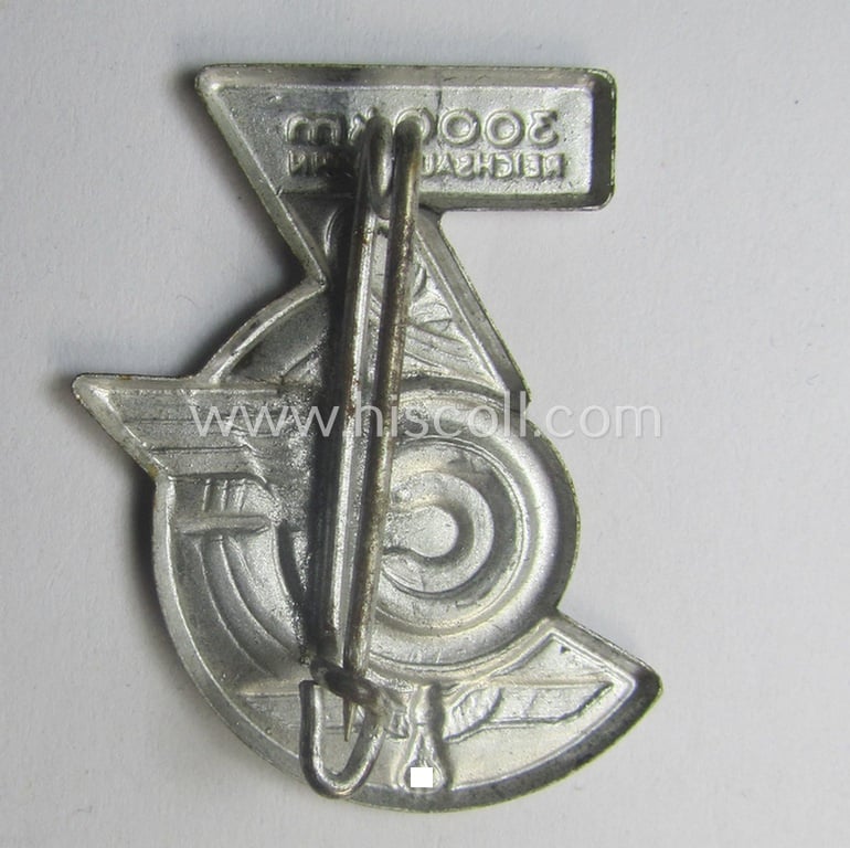 Bright silver-toned, N.S.D.A.P.-related 'tinnie' (ie. 'Tagungs- o. Veranstaltungsabzeichen'-) being a non-maker-marked example depicting a capital '3'-numeral coupled with a 'Reichsadler'-device and text: '3000 km Reichautobahn'