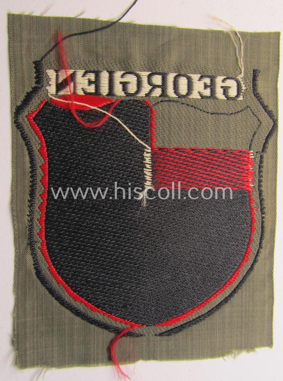 Attractive, 'BeVo'-type armshield entitled: 'Georgien' (being a 'virtually mint- ie. unissued' example as intended for a volunteer who served within the 'Deutsche Wehrmacht' ie. within the 'Georgisches Legion')
