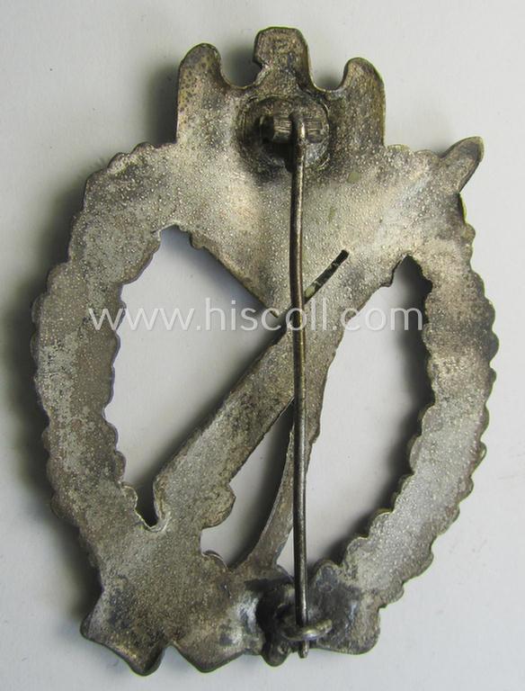 Attractive, 'solid-back' 'Infanterie Sturmabzeichen in Silber' (or: silver infantry-assault badge ie. IAB) being a non-maker-marked example as executed in zinc-based metal (ie. 'Feinzink') as was produced by the: 'Wilh. Deumer'-company
