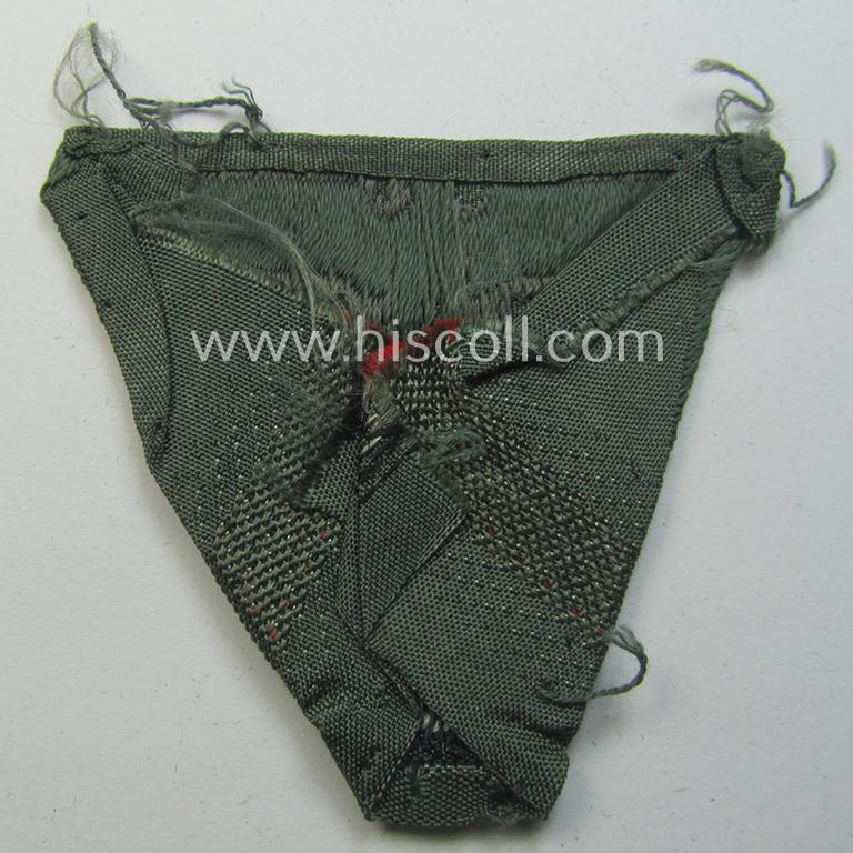 WH (Heeres) so-called: 'M43-pattern') cap-eagle/cocarde (ie. cap-trapezoid) as was specifically produced for usage on the so-called: 'M-43'-model field-caps (ie. 'Einheitsfeldmützen')