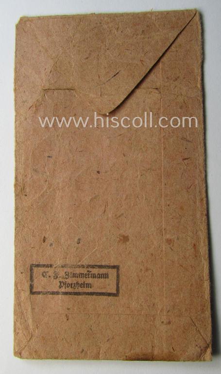 Empty 'Zellstoff'-based pouch as was intended for a medal: 'Winterschlacht im Osten 1941/42' as was produced by the: 'C.F. Zimmermann'-company (ie. 'Hersteller 20')