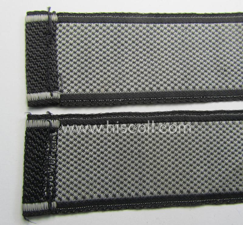 Waffen-SS, 1943/44 pattern cuff-title (ie. 'Ärmelstreifen') depicting the machine-woven Latin script text in silver-grey linnen as was intended for a member of the: 'SS-Regiment "Westland" (ie. part of the: '5. SS-Pz-Gren.-Div. "Wiking")