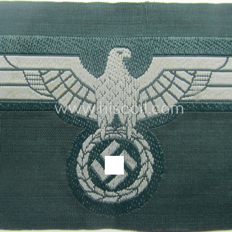 WH (Heeres) early- (ie. pre-war-) period- and/or greyish-coloured breast-eagle of the: 'M36'- (ie. 'M40'-) pattern as was executed in the 'BeVo'-weave pattern on a darker-green-coloured background
