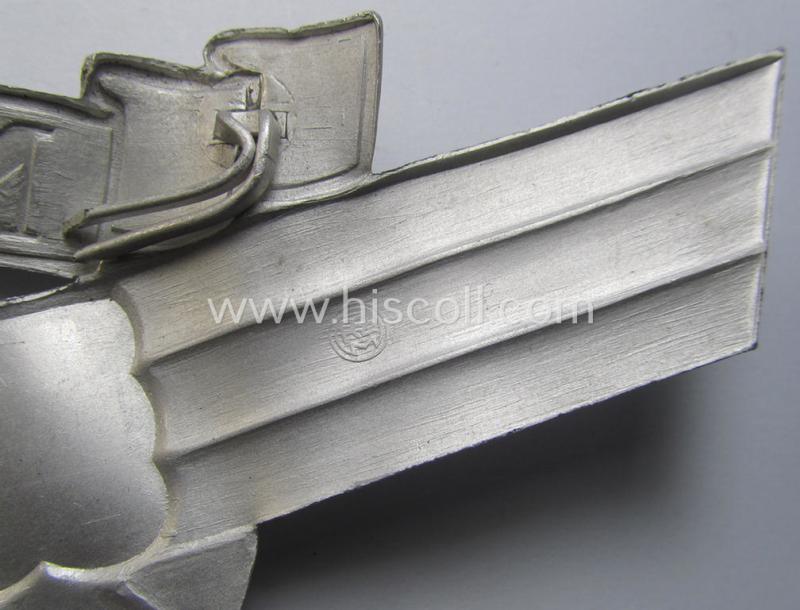 Aluminium-based so-called: N.S.K.K. (or: 'National Socialistisches Kraftfahr Korps') crash-helmet eagle-device (ie. 'Adler für N.S.K.K.-Sturzhelm') being a neatly maker- (ie. 'RzM M1/8'-) marked example of the second pattern