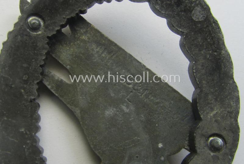 WH (Luftwaffe) 'Fallschirmschützen-Abzeichen' (or: paratroopers-jumpbadge) being a neatly maker- (ie. 'B&N - L'-) marked- and typical zinc- (ie. 'Feinzink'-) based example as was produced by the maker: 'Berg u. Nolte'