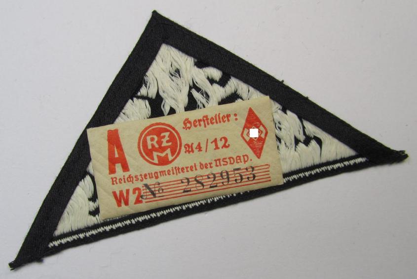 Attractive, 'HJ' ('Hitlerjugend') ie. 'BDM' ('Bund Deutscher Mädel'-) district-triangle (ie. 'Gebietsdreieck') entitled: 'Süd Württemberg' (being a never worn example that still retains its period-attached 'RzM'-etiket)