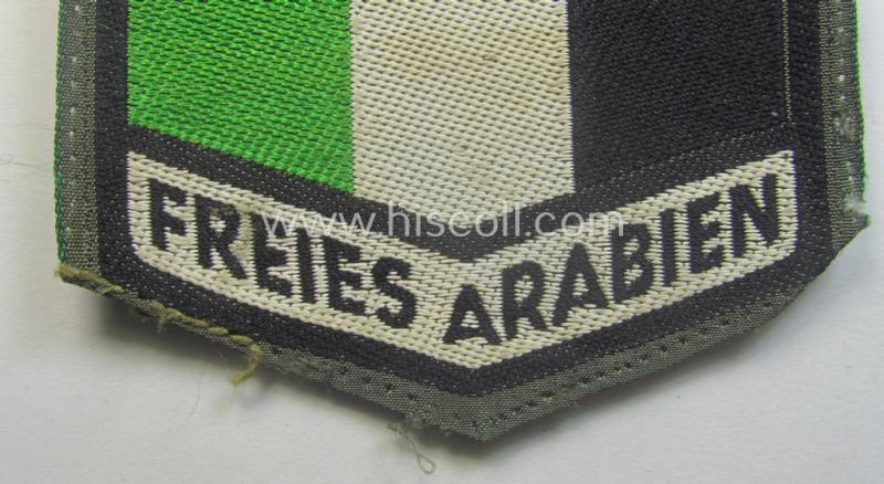 'BeVo'-type, volunteeer armshield entitled: 'Freies Arabien' being intended for usage by a volunteer who served within the 'Deutsche Wehrmacht' (being a truly used- and/or carefully tunic-removed example)