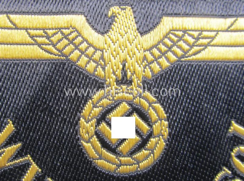 'DRB'- (ie. 'Deutsche Reichsbahn'-) related arm-eagle (ie. 'Ärmeladler') as executed in 'BeVo'-weave style as was intended for an official of the: 'Deutsche Reichsbahn' ie. the: 'WVD Brüssel' (or: 'Wehrmacht-Verkehrsdirektion Brüssel')