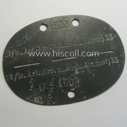 Zinc-based, WH (Heeres) ie. 'leichte Artillerie'-related ID-disc bearing...