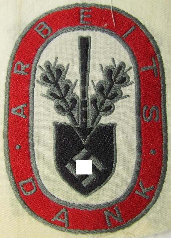 Superb - and never before seen! - multi-coloured- and/or neatly 'BeVo'-woven so-called: 'Reichsarbeitsdienst'- (ie. RAD-) related sport-shirt-patch entitled: 'Arbeitsdank' (that comes in a 'virtually mint'- and/or never tunic-attached conditi...