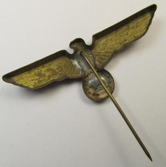 WH (Kriegsmarine) 'single-pattern'-eagle-pin being a non-marked example as was intended for attachment to the (darker-blue- ie. white-topped-) so-called: 'Tellermützen'
