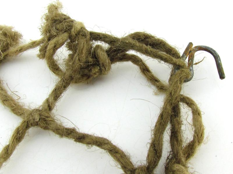 Complete late war German helmet net with attachment hooks