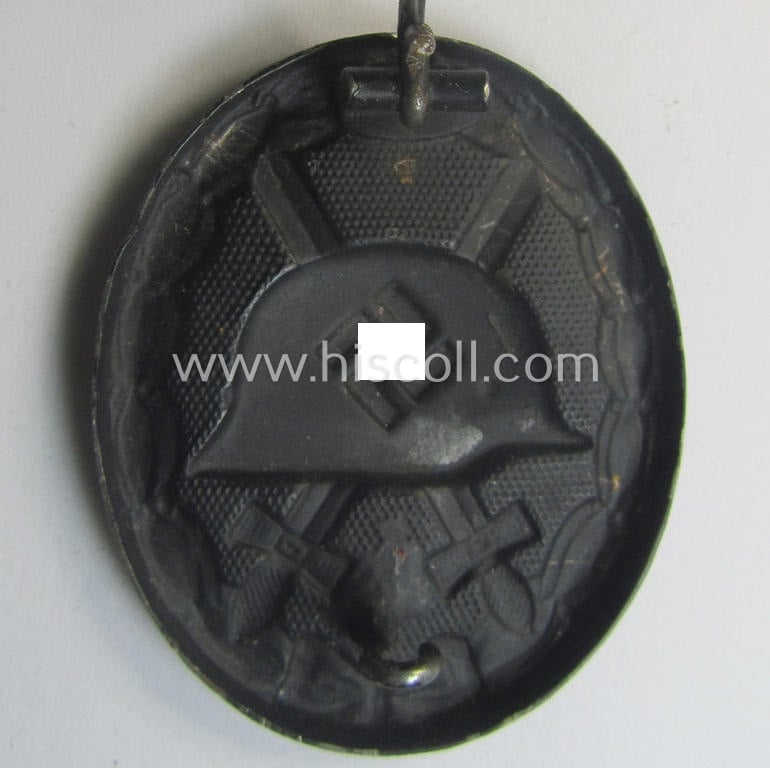 Neat - albeit non-maker-marked and magnetic! - example of a black-class wound-badge (or: 'Verwundeten-Abzeichen in Schwarz') that comes in an overall nice- (ie. I deem just minimally used-), condition