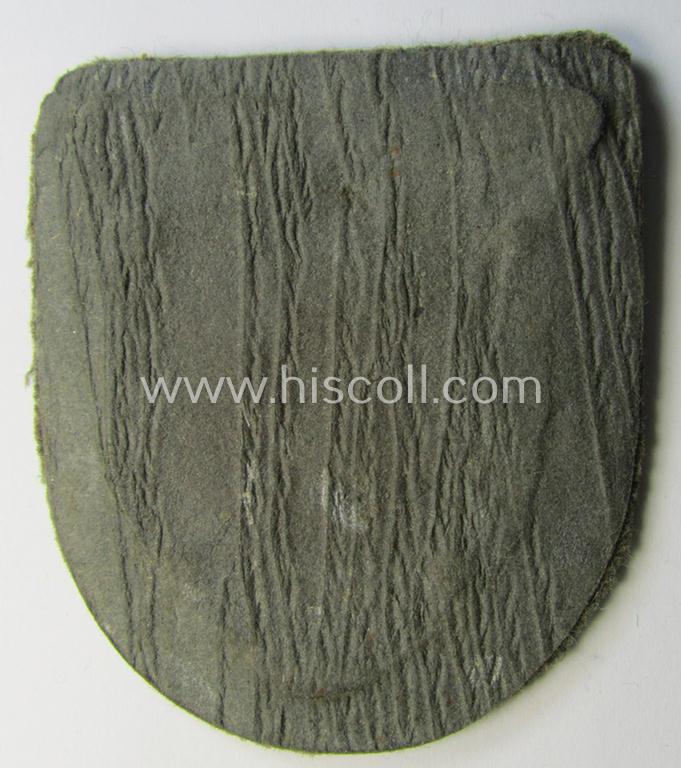 Very attractive - and actually scarcely encountered! - WH (Heeres ie. Waffen-SS) 'Kuban'-campaign-shield that comes mounted onto its original field-grey-coloured- and/or woolen-based 'backing'