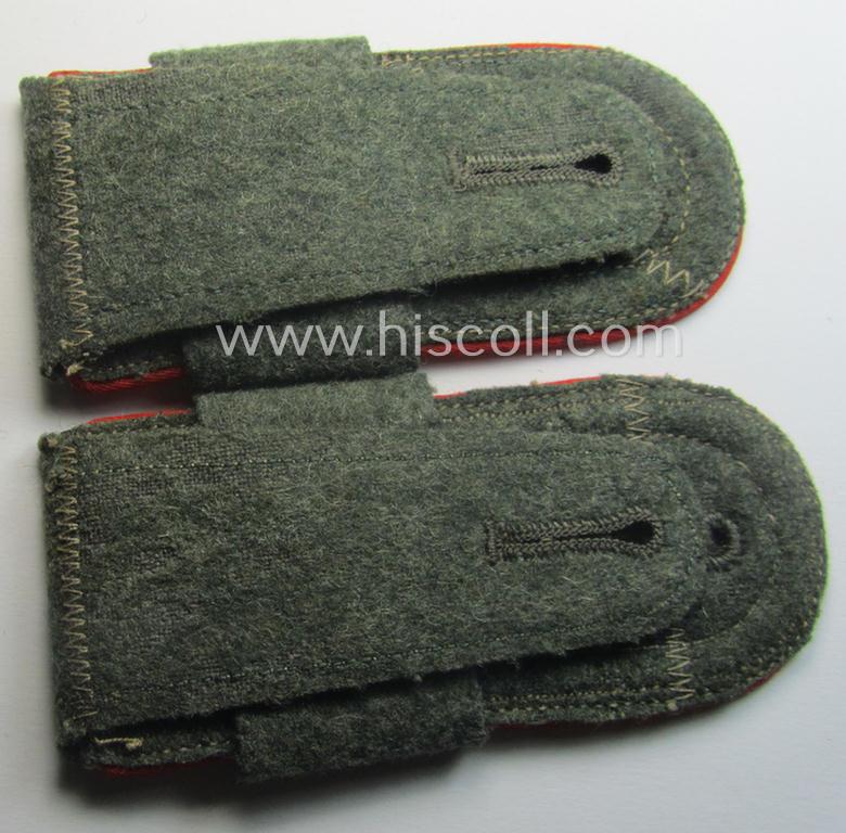 Pair of mid-war-period, so-called: 'M41 o. M43'-pattern, WH (Heeres) NCO-type shoulderstraps that comes with its accompanying 'Überschube'-pair as was intended for an: 'Unterwachtmeister des Artillerie-Rgts. 239'