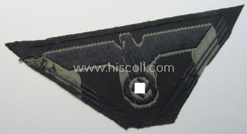 Attractive - and scarcely found! - later-war-period, WH (Heeres) - ie. 'Panzer'-related, so-called: 'M44'-pattern, trapezoid-shaped breasteagle being a greyish-coloured example as executed in the 'BeVo'-weave pattern on a black-coloured backgro...