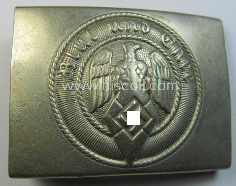 Attractive, HJ (ie. 'Hitlerjugend') bright-silver-coloured- (ie. nickle-chrome-based and early-pattern) belt-buckle being a non-maker- marked example that comes in a just moderately used- ie. worn, condition