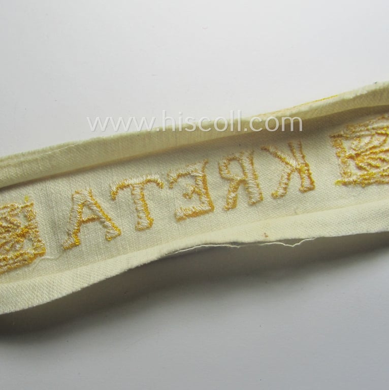 WH cuff-title (ie. 'Ärmelstreifen') entitled: 'Kreta' (being an example that bears a printed 'RbN.'-numeral) and that comes in a surely issued albeit simply never worn nor once tunic-attached, condition