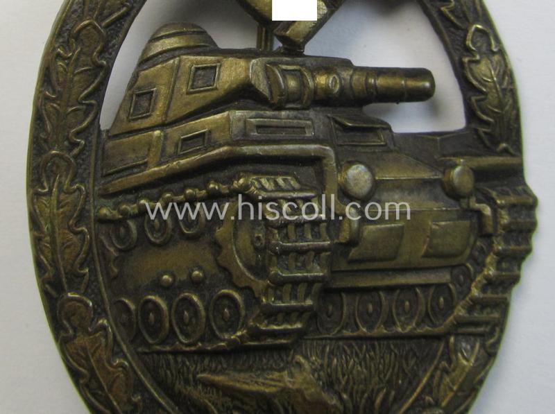 Superb - and actually scarcely encountered! - example of a: 'Panzerkampf-Abzeichen in Bronze' being a typical 'hollow-back', non-maker-marked- (and/or: 'Buntmetall'- ie. 'Tombak'-) based example as was procuced by the: 'Karl Würster'-compan...