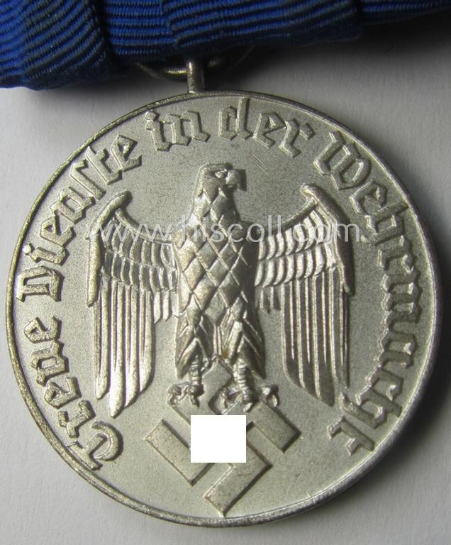 Bright silver-toned - and neatly detachable! - WH (Luftwaffe) so-called: 'Einzelspange' showing a: 'WH-Dienstauszeichnung 4. Stufe' (as was intended for 4 years of loyal-service) and that shows a detailed, LW-type-eagle-device, period-attached