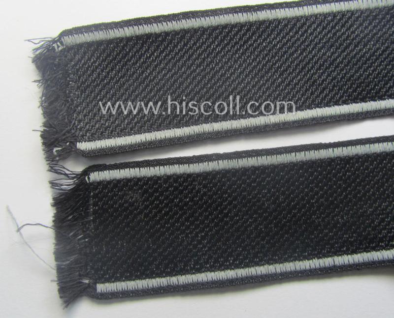 Waffen-SS, 1943/44 pattern cuff-title (ie. 'Ärmelstreifen') depicting the machine-woven Latin script text in silver-grey linnen as was intended for a member of the: '34. SS-Freiwilligen-Grenadier-Division': “Landstorm Nederland”