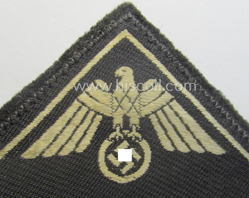 German Red Cross (ie. 'Deutsches Rotes Kreuz' or 'DRK') related, EM- (ie. NCO-) type, greyish-coloured- and/or (typically) triangular-shaped arm-eagle as executed in the neat 'BeVo'-weave pattern entitled: 'Schwabach 1'