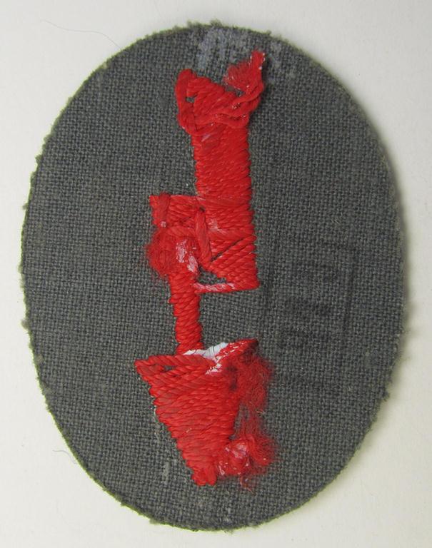 WH (Heeres) trade- and/or special-career-insignia ie. hand-embroidered 'signal-blitz' being a nicely maker-marked example as executed in bright-red linnen as was specifically intended for a soldier within the: 'Artillerie-Truppen'