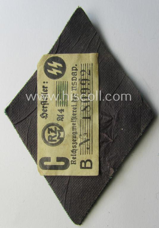 Waffen-SS, officers'-pattern, hand-embroidered sleeve-insignia (ie. 'Ärmelraute') for an: 'SS-Führer im Verwaltungsdienst' still retaining its period 'RzM'-etiket