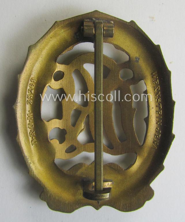 'Reichssportabzeichen DRL in Gold' (or: golden-class DRL sports'-badge) being a truly detailed and/or: maker- (ie. 'Wernstein - Jena'-) marked example that comes stored in its (rare!) period carton-based box
