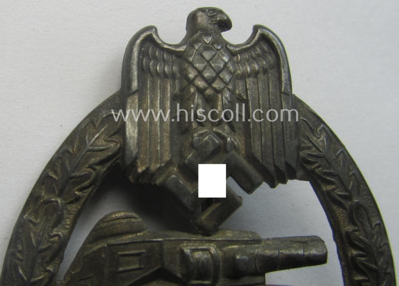 'Panzerkampfabzeichen in Silber' (or: silver-class panzer-assault badge or PAB) being a non-maker-marked- and/or hollow zinc- (ie. 'Feinzink'-) based example as was produced by the: 'Paul Meybauer'-company