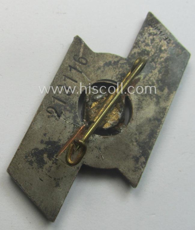 DJ- (ie. 'Deutsches Jungvolk'-) so-called: 'Leistungsabzeichen in Bronze' (or: bronze-class youth sports'-badge) being a maker- (ie. 'RzM - M1/35'-) marked specimen that shows an engraved (unique) bearers'-numeral ('213116')
