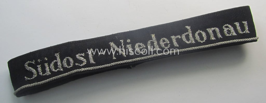 Stunning - and very rarely encountered! - example of a hand-embroidered BDM- (ie. 'Bund deutscher Mädel') officers'-pattern cuff-title (ie. 'Ärmelstreifen für Führerinnen der Bund deutscher Mädel') entitled: 'Südost-Niederdonau'
