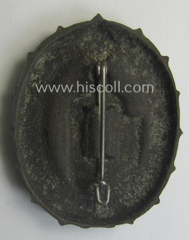 Greyish-silver-coloured- and (unusually!) 'molded'-aluminium-based, N.S.D.A.P.-related day-badge (ie. 'tinnie' or: 'Veranstaltungsabzeichen') bearing the text: 'Gauwoche Sachsen 1937' (being a maker- ie. 'K. Würster'-marked example)