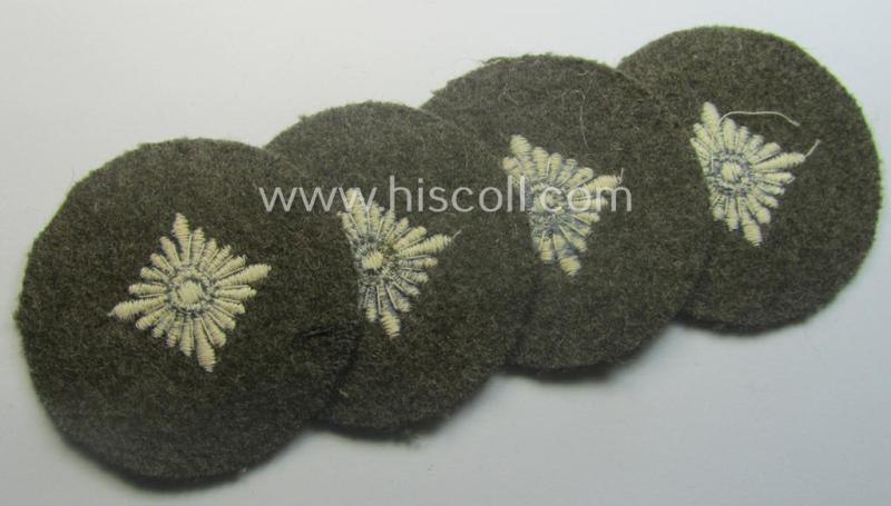 WH (Heeres) 'standard-type'- and early-pattern, tropical-style rank-insignia (ie. roundel), as executed in bluish-grey coloured linnen on a brownish-green background: 'Oberschütze'