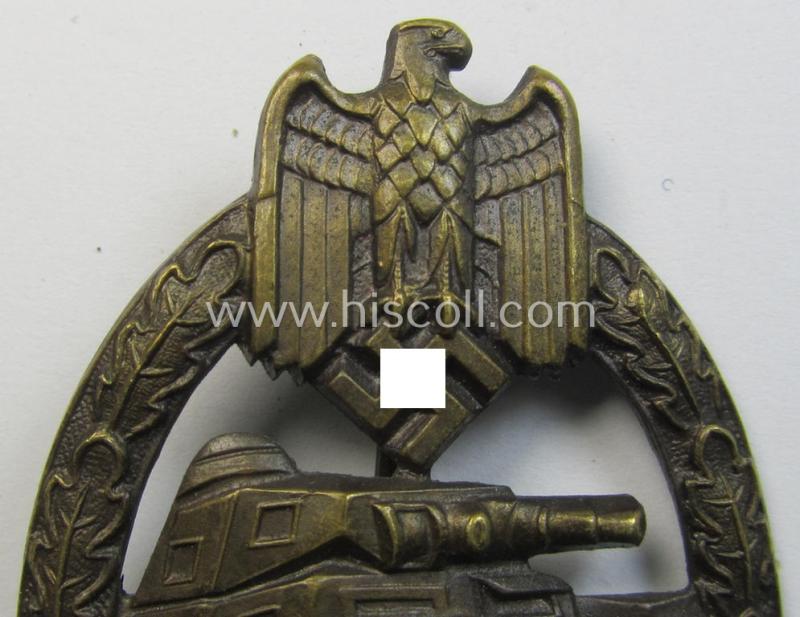 Superb - and actually scarcely encountered! - example of a: 'Panzerkampf-Abzeichen in Bronze' being a typical 'hollow-back', non-maker-marked- (and/or: 'Buntmetall'- ie. 'Tombak'-) based example as was procuced by the: 'Karl Würster'-compan...