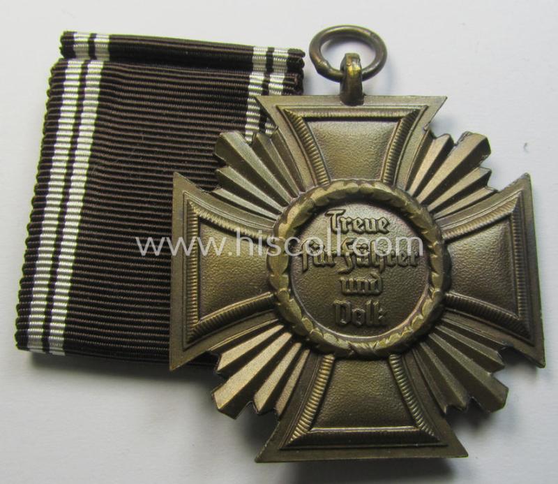 Attractive, 'N.S.D.A.P. Dienstauszeichnung in Bronze' (ie. '3. Stufe für 10 Jahre t. Dienste') being a (typical) non-maker-marked- (and 'light-weight'!) example that comes together with its (full length!) period ribbon (ie. 'Bandabschnitt')