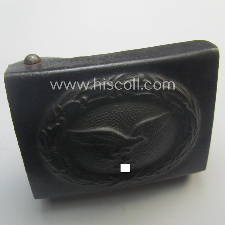 Moderately used example of a WH (Luftwaffe) blue-coloured- and/or typical steel-based belt-buckle, being a clearly maker- (ie. 'EC'-) marked example
