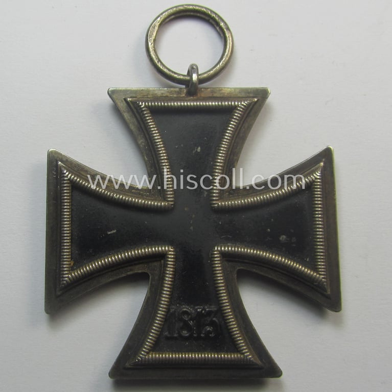 Scarcely seen, 'EK II. Klasse' being a maker- (ie. '123'-) marked example that comes with its original and once-mounted ribbon (ie. 'Bandabschnitt') as was produced by the desirable maker (ie. 'Hersteller'): 'Beck, Hassinger & Co.'