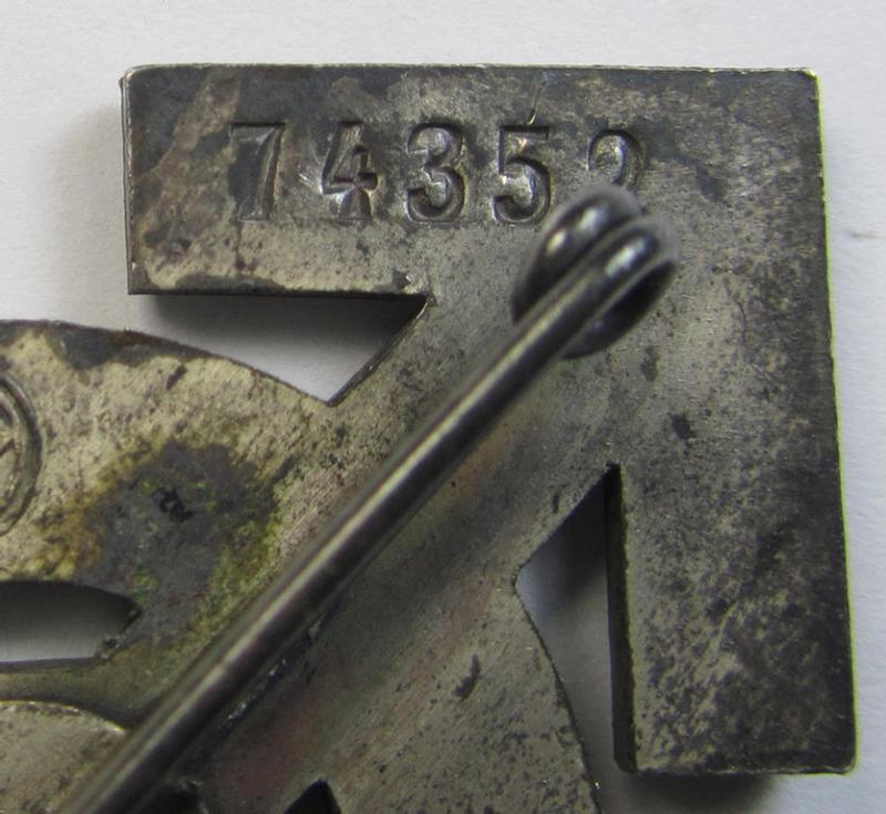 Attractive, HJ- (ie. 'Hitlerjugend'-) sports-badge (or: 'HJ-Leistungsrune') of the silver-class being a clearly maker- (ie. 'RzM - M1/34'-) marked- and/or: 'Buntmetall'-based specimen that shows an engraved (unique) bearers'-numeral ('74352...