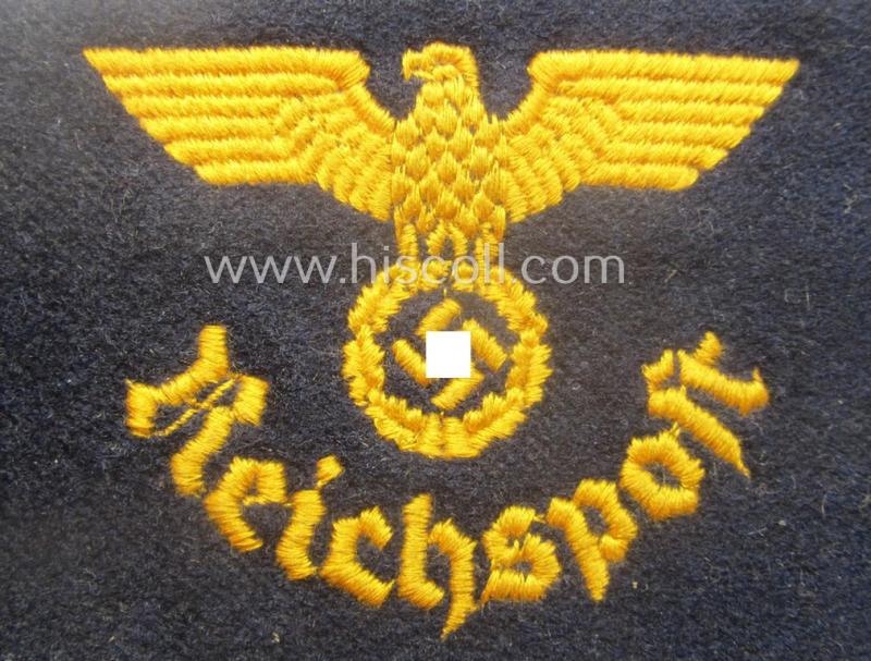 Darker-blue-coloured- and/or woolen-based so-called: 'Reichspost'-related armband (ie. 'Armbinde') being of the 'woven'-type and that comes in a moderately used- ie. worn, condition