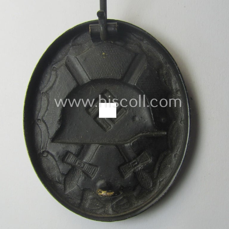 Neat - albeit non-maker-marked and typical non-magnetic! - example of a black-class wound-badge (or: 'Verwundeten-Abzeichen in Schwarz') that comes in an overall nice- (ie. I deem just minimally used-), condition