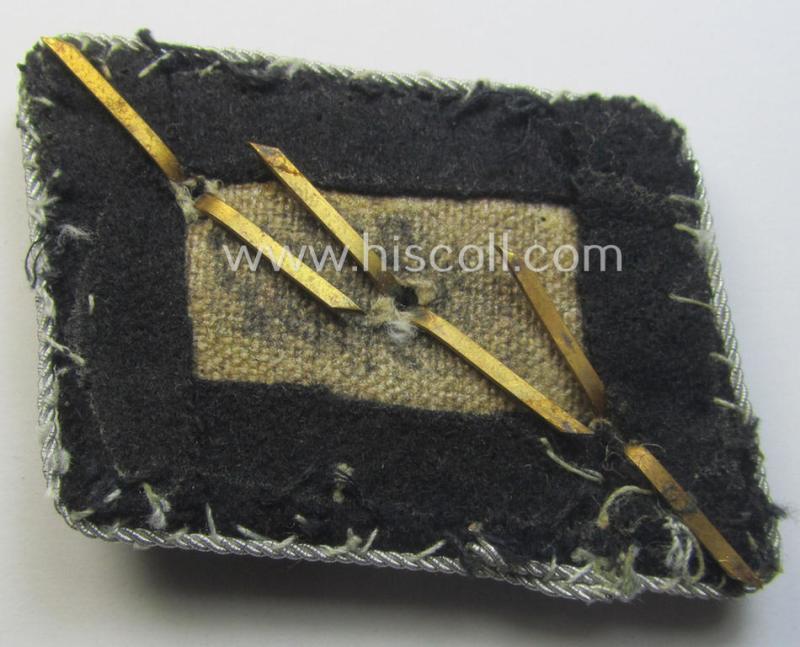 Waffen-SS (ie. 'SS') officers'-pattern collar-rank-tab ('Kragenspiegel für Führer') being a 'standard-issue'- (ie. 'RzM'-) pattern example as executed in the black-coloured wool as was intended for an: 'SS-Untersturmführer'