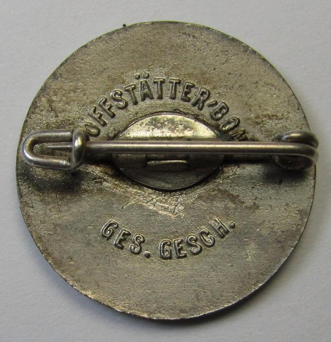 Neat set comprising of a: 'Mitgliedsabzeichen des Nationalsozialistische Lehrerbundes' (ie. 'N.S.L.B.') (showing the makers'-designation: 'Hoffstätter - Bonn') and that comes with its accompanying  'Mitgliedskarte' as issued