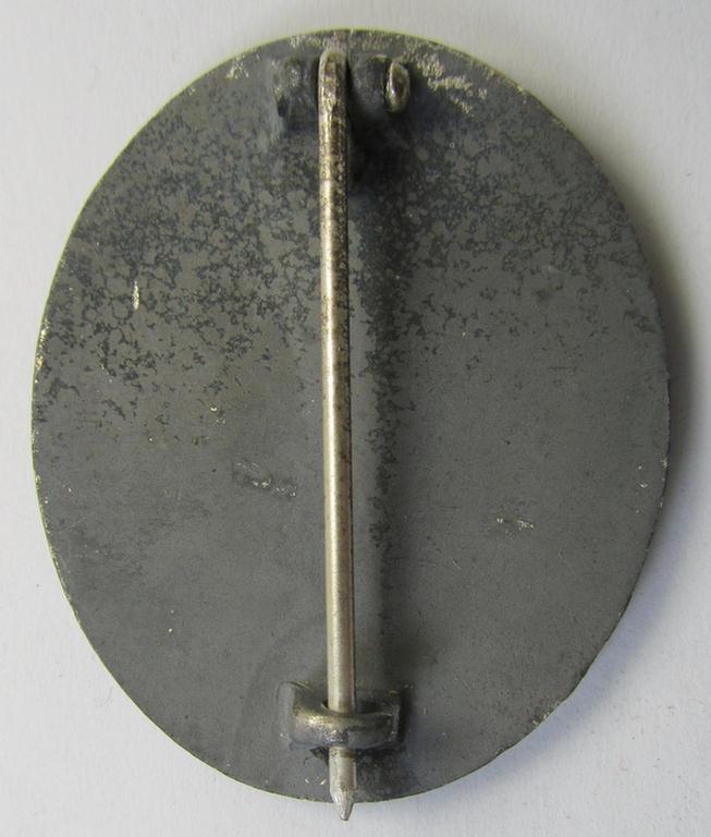 Moderately used, non-maker-marked example of a silver-class wound-badge (or: 'Verwundeten-Abzeichen in Silver') being a typical zinc- (ie. 'Feinzink'-) based example